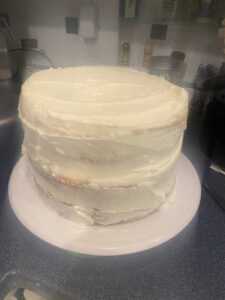 round cake with white frosting